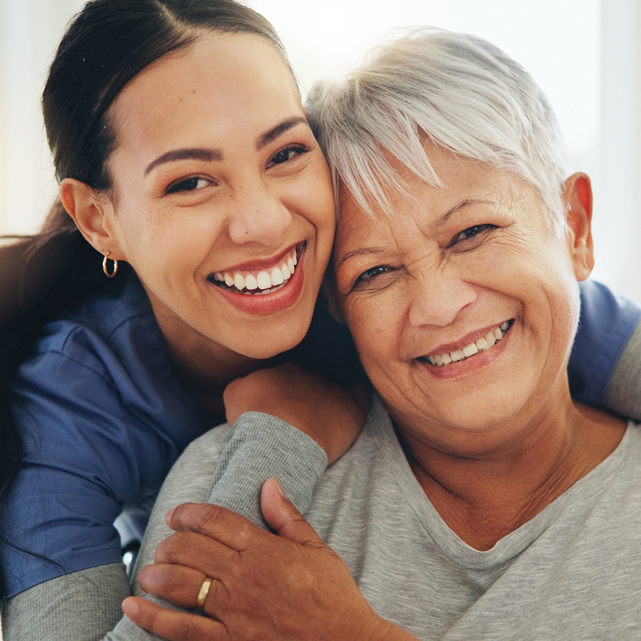 Happy nurse with senior patient